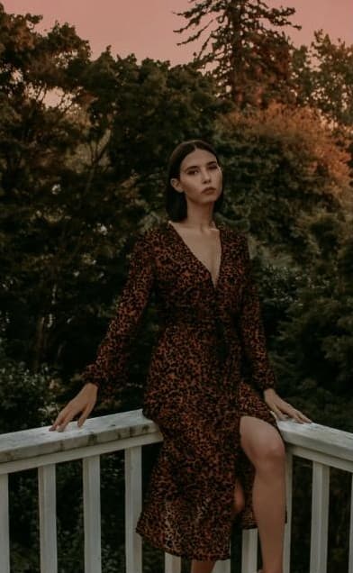 Stage 3: full-body photo on a balcony
