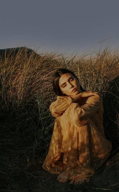 Stage 3: photo sitting in tall grass